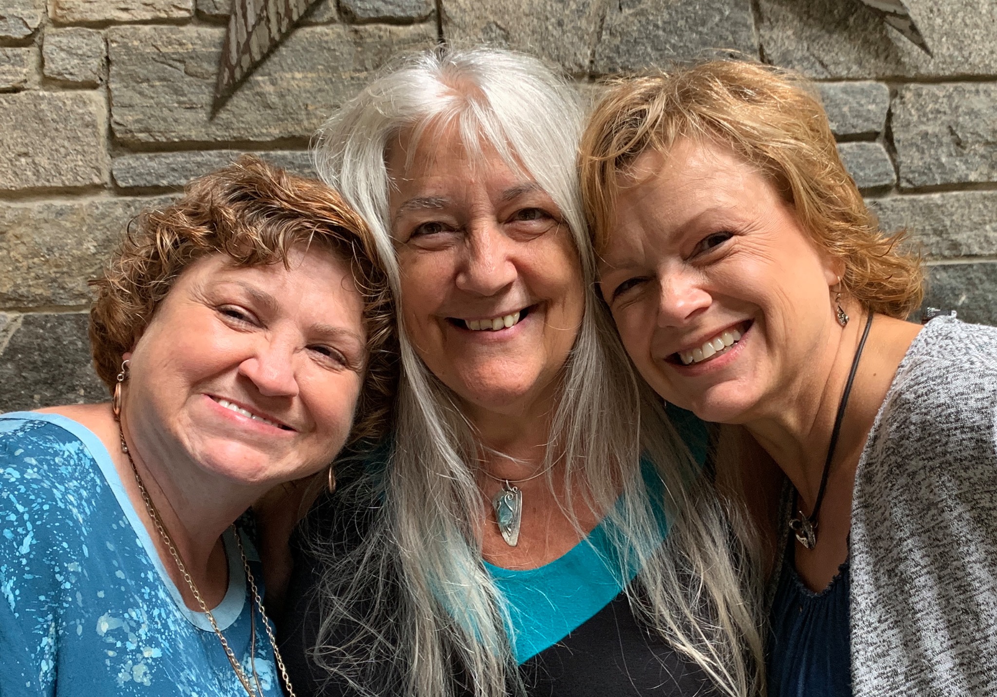 Paula McDowell, Lis-el Crowley, and Wendy McManus, the co-founders of AMCAW