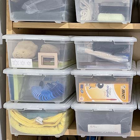 Storage boxes on shelf